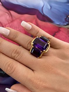 Ladies Custom Jewelry Chunky 18 Karat Yellow Gold Triple Emerald Cut Purple Amethyst Statement Ring 20.4 grams total weight of ring Ring Size: 6 and 3/4 Ring can be adjusted to any finger size please inquire  Center Stone Measurement: 18mm by 13mm Side Stones: 12.5mm by 10mm Solid 18 Karat Yellow Gold stunning statement ring Official jewelry appraisal available upon request (+50$) Luxury Large Stone Jewelry, Luxury Purple Ring Jewelry, Luxury Purple Jewelry Ring, Luxury Amethyst Ring Jewelry, Luxury Polished Amethyst Ring, Purple Open Ring Formal Jewelry, Formal Purple Open Ring Jewelry, Jewelry Chunky, Jewelry Appraisal