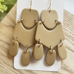 Large size, beige linked clay dangle earring Beige Nickel Free Dangle Earrings, Beige Nickel-free Dangle Earrings, Nickel-free Beige Dangle Earrings, Beige Dangle Jewelry For Everyday, Beige Dangle Earrings For Everyday, Everyday Beige Dangle Jewelry, Beige Dangle Earrings With Ear Wire, Beige Drop Earrings With Ear Wire, Beige Dangle Jewelry With Ear Wire