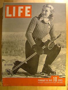 the cover of life magazine features a woman on skis and holding two ski poles