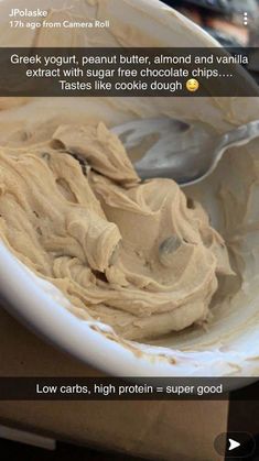 a white bowl filled with batter on top of a table