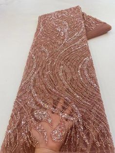 This high quality Fabric is measured in 5 Yards With Embroidered Beading and Sequin. It is soft, very delicate and beautiful. This high Quality Fabric is made with Fashion embroidered rhinestones can be used in making party wedding dresses, skirts, shawls, scarves and other other fashion apparels as you would like. Size : Length : 5 yards (180 inch). Width: 50 inch (Please allow slight deviation for the measurement data ,±1 inch) Material: 100% Polyester, Tulle Lace Fabric, Eco-Friendly embroide Glamorous Fitted Embroidered Fabric For Wedding, Elegant Fitted Tulle Fabric With Pearl Embroidery, Elegant Sparkling Tulle Fabric For Evening, Elegant Embroidered Fabric With Rhinestones For Party, Elegant Pearl Embroidered Tulle Fabric For Party, Elegant Tulle Fabric With Pearl Embroidery For Party, Elegant Beaded Tulle Fabric, Elegant Embellished Tulle Fabric For Party, Elegant Embellished Fitted Tulle Fabric