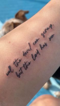 a person with a tattoo on their arm that says, we are the only one who can