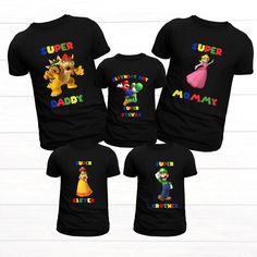 💖 WELCOME TO MY STORE 💖 Custom t-shirts for all occasions, we can translate all your ideas into t-shirts for birthdays, holidays and family trips. PLEASE READ  Personalized Super Mario theme birthday shirts for the family. You may choose any name you would like to be displayed on the shirt Examples: Mom, Daddy, Sis, Grandma, Paw Paw, Bonus Mom, Auntie, Glam Ma, Etc Choose your color and size: Check out our color availability photos to choose the perfect shade for your shirt. Please refer to the size chart to ensure correct fit. There are no refunds or product exchanges in cases not related to defects in product manufacturing or shipping errors. Please make sure you choose the correct size and color before making payment. Thank you for visiting our store and happy shopping! If you have an Multicolor Family Matching Tops For Birthday, Family Matching Multicolor Tops For Birthday, Fun Character Print Tops For Family Events, Funny Character Print Tops For Birthdays, Customizable Multicolor Family Matching Tops, Funny Black Tops For Birthday, Black Tops With Graphic Print For Family Events, Fun Graphic Print Tops For Family Events, Funny Character Print Tops For Birthday