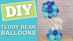 a teddy bear sitting on top of balloons with the words diy in front of it