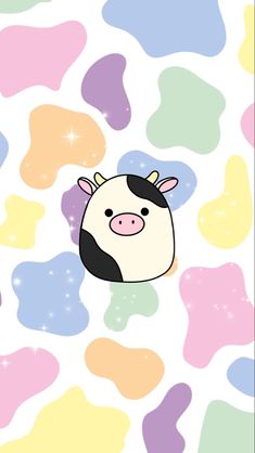 a cartoon cow is in the middle of colorful spots on a white background with blue, pink, yellow and green colors