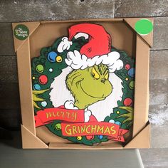 a cardboard box with an image of dr seuss and the grinchmas on it