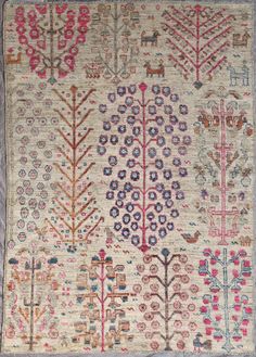 an old rug with various designs on it