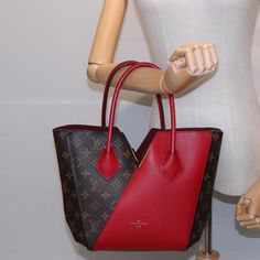 Brand: Louis Vuitton Model: Kimono Color: Red Material: Canvas Inclusions: Dust Bag Dimensions: W25cm x H25cm x D10cm / Shoulder Drop:60cm Serial number: DU2196 Country of origin: France Condition: AB - good condition. Introducing the Louis Vuitton "Kimono" Handbag, an exquisite blend of red leather and iconic brown Monogram Canvas. Meticulously crafted in France, this versatile piece can be worn as both a handbag and a tote, making it a perfect fusion of style and functionality. The exterior of Red Monogram Canvas Shoulder Bag For Travel, Designer Large Capacity Red Shoulder Bag, Designer Red Shoulder Bag With Large Capacity, Red Monogram Canvas Bag With Dust Bag, Luxury Red Bags For Daily Use, Designer Rectangular Red Bag, Red Monogram Canvas Shoulder Bag, Luxury Large Capacity Red Shoulder Bag, Red Luxury Shoulder Bag For Daily Use