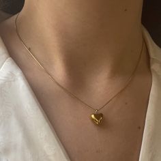 Puffed Mini Heart Necklace in Gold ✨ Fully stainless steel & tarnish proof! (18k gold plated) 16" with a 2" extender  Snake chain style featuring a mini gold puffed heart pendant 🤍 The heart measures 1cm x 1cm Handmade with love! Gold Heart Necklace With Box Chain, Heart Shaped Gold Chain Necklace For Gift, Heart-shaped Gold Chain Necklace For Gift, Gold Heart Shaped Box Chain Jewelry, Gold Heart Necklace As Gift, Gold Heart Pendant Necklace With Box Chain, Gold Plated Heart Necklace With Gold Chain For Gift, Yellow Gold Heart Necklace With Gold Chain, Puffed Heart Necklace