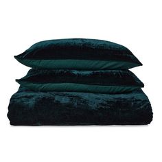 three pillows stacked on top of each other