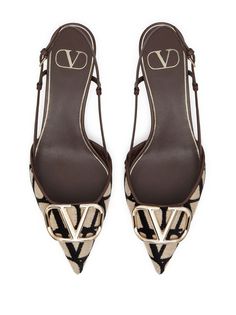 Find VALENTINO Logo Plaque Slingback Pumps on Editorialist. coffee brown/light beige/black leather branded insole low heel pointed toe gold-tone logo plaque buckle-fastening ankle strap Designer Heels With Gold-tone Hardware And Pointed Toe, Luxury Gold Leather Slingback Pumps, Designer Beige Pointed Toe Slingback Pumps, Designer Beige Slingback Pumps With Pointed Toe, Luxury Brown Slingback Pumps With Buckle Closure, Luxury Slingback Pumps With Leather Sole, Luxury Low Heel Slingback Pumps With Buckle, Designer Slingback Pumps With Branded Heel Counter, Luxury Slingback Pumps With Buckle And Low Heel