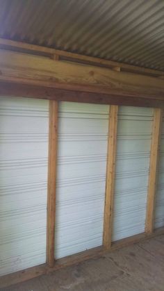 an empty garage with several closed doors