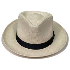 The Stetson Retro Panama Straw Fedora is your classic handwoven, panama style hat but with a bit of a Stetson twist. This hat is a genuine Panama hat meaning it's hand made from South American Toquilla tree fibers, giving this hat a unique charm thats 100% authentic. The hat also features a stylish grosgrain hat band in black to accent the natural colored fibers this hat is made from. Brim: 2.5" Crown: 4" Panama Style, Upf Clothing, Outback Hat, Straw Fedora Hat, Fedora Hats, Straw Fedora, Hat Band, South American, Fedora Hat