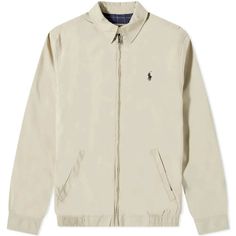 The iconic Polo pony-embroidered Harrington jacket is a timeless essential for any Instagram feed. Cut from durable polyester fabric in classic khaki and lined in preppy checks, this lightweight layer offers vintage style inspired by heritage brands. Interior pockets and elasticized hem provide functionality, while two zippered side pockets lend signature details. Contemporary yet vintage-inspired, this versatile windbreaker flatters any look with effortless Ivy League charm ideal for capturing Ralph Lauren Harrington Jacket, Ralph Lauren Jacket, Cream Jacket, Polo Pony, Harrington Jacket, Mens Windbreaker, School Aesthetic, Ivy League, Cute Jackets