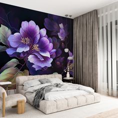 a bedroom with purple flowers painted on the wall