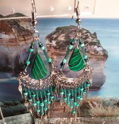 Beautifully made with glass seed beads of iridescents green, turquoise, and black tassels. The teardrop is painted wood of black, green, and turquoise. Overall the 4 inch length makes them more to an adult style  than a young girls. Earrings With Tassels, Celtic Knot Earrings, Green And Turquoise, Turquoise And Black, Pretty Beads, Nature Green, Knot Earrings, Glass Seed Beads, Green Turquoise