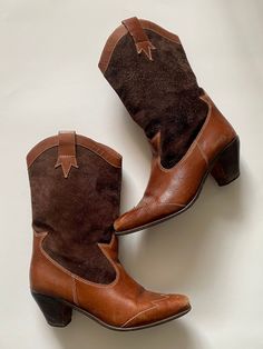 Chestnut leather and brown suede western heeled boot.  * Made in Brazil  * Size 8B (fits closer to 7-7.5) Brown Leather Heeled Boots For Western-themed Events, Suede Heeled Boots For Western-themed Fall Events, Suede Heeled Boots For Fall And Western-themed Events, Brown Country Style Heeled Boots For Fall, Brown Suede Heeled Boots With Snip Toe, Brown Round Toe Heeled Boots For Rodeo, Brown Suede-lined Boots For Rodeo, Brown Heeled Boots With Suede Lining And Snip Toe, Brown Snip Toe Heeled Boots With Suede Lining