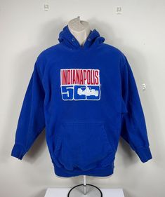 Vintage Indianapolis 500 hoodie  Reverse Weave  Heavyweight: 80% Cotton/20% Polyester Embroidered design very nice pre-owned vintage condition.  We try to note any flaws. However, this item is pre owned vintage, and therefore may have small stains or imperfections that enhance its individual character.    Royal Blue Adult Small Top of collar to bottom: 27" Armpit to armpit: 21" Vintage Blue Hoodie For Streetwear, Blue Hooded Throwback Sweatshirt, Throwback Blue Cotton Hoodie, Unc Hoodie, Vintage Blue Hoodie For Sports, Indianapolis 500, Small Tops, Embroidered Design, Royal Blue