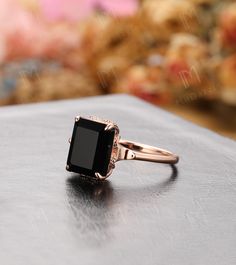 We are jewelry artisans and manufacturers. Every Jewelry is made from the very scratch, and made by hand and carefully polished especially for you. OUR ITEM DESCRIPTION ✦ Handmade, high-quality item! Metal type and purity: Solid 10k/ 14k/ 18k rose & white, yellow gold ◆ Center Stone ◆ * Type: Natural Black Onyx/ Black Agate * Stone Cut: Emerald Cut, 8x10mm ◆ Side Stones ◆ * Type: None ◆ Width of the band: 1.40 mm ◆ ◆ All sizes are available, contact me if they do not contain the size you wan Black Onyx Gold Ring, Black Quartz Ring, Classic Yellow Gold Onyx Rings, Elegant Onyx Crystal Ring With Gemstone, Elegant Onyx Crystal Ring, Black Agate Stone, Hand Ring, Makeup Clothes