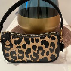 Brand New Leather Animal Print Bag With Gold Hardware. It’s A Shoulder Bag . Pretty For Date Nights . Can Fit A Phone A Wallet And Some Other Essentials. Trendy Coach Evening Bags, Trendy Evening Coach Bag, Coach Leather Clutch Bag, Designer Leather Bags In Leopard Print, Evening Bags With Leopard Print And Detachable Strap, Elegant Evening Shoulder Bag In Leopard Print, Evening Bags With Detachable Strap In Leopard Print, Designer Leopard Print Bag For Everyday Use, Designer Rectangular Bag In Leopard Print