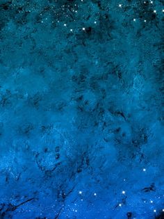 an abstract blue background with stars in the sky and water on it's surface