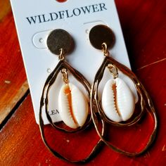 Goldtone Cowrie Shell Pierced Earrings Bohemian Gold Flower Earrings For Beach, Gold Dangle Teardrop Earrings For Beach, Gold Cream, Cowrie Shell, Cream And Gold, Earrings Color, Pierced Earrings, Earings Piercings, Gold Tones