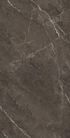 a dark brown marble textured wall and floor