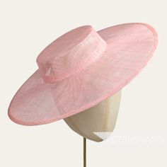 *This is not a fitted hat! You will need to attach a headband, comb or elastic to secure it to your head* Boaters are all the rage, and this pale pink sinamay fascinator version has us all in a twirl!  Made from 2 layers of stiffened sinamay, these boaters are ready to trim and have a petersham ribbon on it's inside edge. Simply add a comb or headband to secure to the head. Hat base measures: Width: 37cm (14.5 inches) Crown Width: Measures 15.5cm (6.1 inches) wide at base and 14cm (5.5 inches) a Pink Curved Brim Fascinator For Races, Pink Wide Brim Sinamay Hat, Pink Curved Brim Fascinator For Event, Pink Curved Brim Hat For Events, Elegant Pink Flat Brim Fascinator, Hat Base, Rose Pale, Millinery Hats, Fascinator Hats