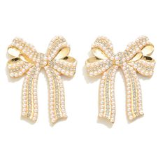 Beautiful Pearl + Rhinestone Bow Earrings are perfect for your holiday party. Zinc Alloy Lead and Nickel Free 1.77"L. Glamorous Rhinestone Earrings For Gifts, White Jewelry For Holiday Party, White Holiday Party Jewelry, Crystal Dangle Pearl Earrings For Party, White Party Earrings With Bling, Party Pearl Earrings, White Bling Earrings For Party, Party White Bling Earrings, Elegant Gold Earrings For Holiday