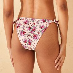 Women's Low-Rise Ultra High Leg Extra Cheeky Side-Tie Bikini Bottom - Wild Fable™ Pink/Red Floral Print L Summer Swimwear With Side Ties And Tie-side Bottom, Drawstring Bottoms For Sunbathing On Vacation, Vacation Drawstring Bottoms For Sunbathing, Beachwear Bottoms For Sunbathing With Tied Details, Adjustable Side Ties Beach Bottoms, Summer Bottoms With String Tie For Sunbathing, Fitted Swimwear With Adjustable Tie-side Bottom, Beach Swimwear With Adjustable Tie-side Bottom, Beachwear Swimwear With Adjustable Tie-side Bottom