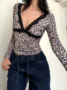 𝔇𝔢𝔱𝔞𝔦𝔩𝔰: Style: Hyper Feminine, Y2k, Shibuya Material: Spandex The stunning cheetah print design paired with delicate lace details makes for a flattering and chic look. Stay cute and confident in this must-have wardrobe staple. Made with premium material, perfect for spring & summer Free Shipping with over 80 $ purchase! We ship worldwide!! SIZE LENGTH BUST WAISTS 19 in 30 in 13 inM 20 in 31 in 13 inL 21 in 32 in 14 inItem measured by hands may have 1-2 in differences.SIZE LENGTH BUST SHO Hyper Feminine Y2k, Feminine Y2k, Cheetah Print Design, Black Long Sleeve Top With Tiger Print, Fitted Black Tiger Print Top, Long Sleeve Leopard Print Top With Buttons, Lace Long Sleeve Shirt, Hyper Feminine, Lingerie Costume