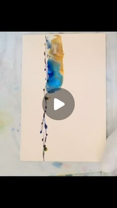 an image of a piece of art with watercolors on it and the text, how to use acrylic paint