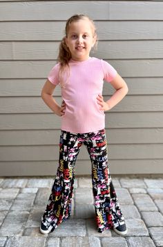 Soft and comfy, but sassy and stylish! These bell bottom pants are a must have in her closet this season! These pants are so versatile, they can be styled with sandals or boots for a sweet boho look. Made from a very soft and stretchy DTY Brushed Polyester/Spandex blend, these pants are not just extremely comfy for your little one, but are very easy care as well! The pants are finished with elastic waistband, which makes it very easy to put on. Finished Measurement Chart:Size 0-3 months : Waist Her Closet, Girls 16, Bell Bottom Pants, Measurement Chart, Boho Look, Bell Bottom, Black Print, Baby Photos