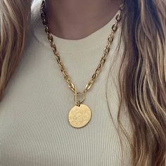 Details: Measurements: 1.1/4" Brass Disc 30" GOLD FILLED CHIAN OTHER FOR OTHER CHAIN OPTIONS Gold Engraved Round Pendant Chain Necklace, Gold Engraved Round Pendant Necklace, Yellow Gold Coin Necklace With Chain Detail, Yellow Gold Coin Necklace With Chain, Gold-tone Round Chain Necklace With Engraving, Gold-tone Round Engraved Chain Necklace, Gold Round Toggle Necklace Tarnish Resistant, Gold Coin Necklace With Chain, Gold Round Coin Necklace With Chain