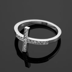 Elegant Cross Rings With Diamond Accents, Elegant Diamond Cross Ring, Elegant Cross-shaped Diamond Rings, Elegant Cross Ring For Anniversary, Diamond Cross Ring With Diamond Accents For Promise, Promise Ring With Cross Shaped Diamond Accents, White Gold Cross-shaped Promise Ring, Elegant Cross-shaped Promise Ring, Elegant Cross-shaped White Gold Ring