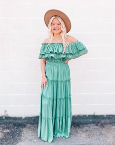 Be an elegant and beautiful showstopper! The Marissa Off The Shoulder Maxi Dress will make heads turn with its graceful, swingy style and shimmy-shaking tiers of tiered ruffle accents. Perfect for a special occasion or a night out on the town! (Cause you deserve it, babe). Flowy Tiered Ruffle Dress For Party, Flowy Layered Tiered Skirt Dress, Tiered Dress With Ruffled Skirt For Brunch, Ruffled Tiered Dress For Brunch, Bohemian Tiered Dress With Ruffles For Garden Party, Tiered Ruffle Maxi Dress For Brunch, Flowy Tiered Ruffle Maxi Dress, Bohemian Tiered Ruffle Dress For Brunch, Tiered Skirt Maxi Dress With Ruffles For Brunch