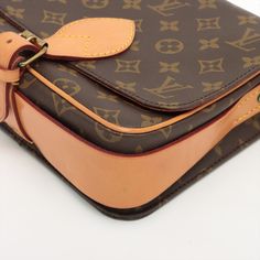 The Louis Vuitton Monogram Cartouchiere is a timeless and classic crossbody bag. The bag's design features a distinct flap with a shield-like shape, giving it a unique and elegant appearance. The bag is crafted from the iconic Louis Vuitton Monogram canvas, known for its durability and instantly recognizable LV monogram pattern. The monogram canvas is complemented by natural cowhide leather trim, which adds a touch of luxury to the overall design. The bag's gold-tone hardware further enhances its sophistication. The bag is a compact and practical bag suitable for everyday use. It has a spacious main compartment that can comfortably hold essential items such as a wallet, phone, keys, and small cosmetics. The interior is lined with premium leather material to protect the contents of the bag. Luxury Gold Flap Bag For Business, Leather Strap Bag, Classic Crossbody Bag, Casual Purse, Practical Bag, Elegant Bags, Monogram Pattern, Lv Monogram, Purse Styles