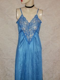 "This is a 60s sky blue silky satiny nylon and lace long nightgown. I believe she is a small   Measurements are  BUST-32-33\"    WAIST-30-31\",  Good Condition Vintage 60s/70s Nylon and Lace Nightgown" Sheer Blue Nightgown For Bedtime, Sheer Blue Nightgown, Blue Sheer Sleeveless Nightgown, Blue Sheer Nightgown, Blue Sheer Lace Sleepwear, Blue Sheer Vintage Sleepwear, Vintage Blue Sheer Sleepwear, Blue Lace Sleepwear For Night, Blue Lace Nightgown With Lace Trim