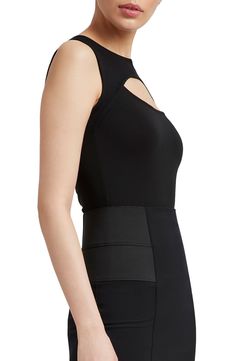 Rock a sleek night-out vibe in this sleeveless top designed with eye-catching cutouts and sheer accents. Jewel neck Sleeveless 96% Tencel® lyocell, 4% elastane with 95% viscose, 5% elastane sheer contrast Tencel lyocell is a more-sustainably produced fiber made with closed-loop processing Machine wash, line dry Imported Elastane Tank Top With Built-in Bra For Night Out, Sleeveless Evening Tops With Built-in Bra, Elastane Tank Top For Night Out, Chic Cutout Tops In Elastane, Elastane Cutout Tops For Night Out, Chic Tank Top With Built-in Bra For Night Out, Cutout Tops For Night Out, Night Out Cutout Tops, Sleeveless Cutout Back Top For Night Out