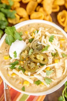 a white bowl filled with chicken tortilla soup