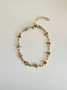 18k Gold Filled Multicolored Gold Star Chain Bracelet, Dainty Bracelet - Etsy Adjustable Gold Star-shaped Chain Bracelet, Adjustable Gold Star Chain Bracelet, Rainbow Star-shaped Jewelry With Star Charm, Multicolor Star Charm Bracelet, Rainbow Star-shaped Bracelet For Gift, Star Chain, Bracelet Dainty, Dainty Bracelet, Dainty Bracelets