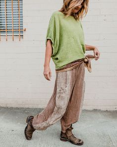 Sandy Shores Linen Pants Embrace the effortless boho vibe with our Sandy Shores Linen Pants. Made from a perfect blend of 50% cotton and 50% linen in Italy, these pants are your go-to for comfort and style. Featuring a relaxed fit with unique color-blocked panels, they bring a touch of artistry to any outfit. Pair them with a simple tee or a flowy blouse, and you'll be ready to stroll the beach or explore the city. Fit: Relaxed, loose fit for ultimate comfort Style: Color-blocked panels for a un Summer Bohemian Baggy Pants, Bohemian Linen Bottoms With Pockets, Green Bohemian Relaxed Fit Harem Pants, Spring Lagenlook Linen Pants, Bohemian Harem Pants Ankle-length For Fall, Bohemian Ankle-length Harem Pants For Fall, Bohemian Ankle-length Pants For Fall, Green Linen Bottoms For Fall, Bohemian Relaxed Fit Cotton Bottoms