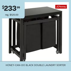 a black table with two trash cans on it and the price is $ 23 99 reg $ 20 00