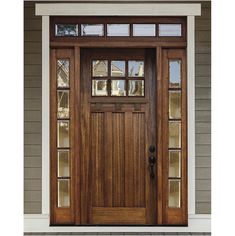 a wooden door with glass panels on the front and side doors, in an exterior setting