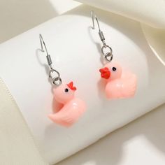 This Adorable Pair Of Pastel Blue Rubber Ducky Duck Earrings Is A Wonderful Addition To Your Wardrobe And Your Style! A Cute Pair! Grwmhr006000wrn Novelty Pink Earrings For Summer, Cute Orange Jewelry For Party, Cute Orange Party Jewelry, Cute Drop Earrings For Summer, Peach Earrings For Summer Gift, Cute Pink Drop Earrings, Cute Pink Jewelry For Summer, Cute Pink Summer Jewelry, Cute Hypoallergenic Summer Earrings