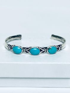 Native American Navajo Handmade Sterling Silver and Turquoise Cuff Bracelet * L 7"   includes gap   slightly adjustable  * W 1/4 * Sterling Silver 9.25 Thick Gauge * Nevada Turquoise  * Signed  * Authentic Adjustable Southwestern Turquoise Cuff Bracelet, Adjustable Turquoise Southwestern Cuff Bracelet, Turquoise Bracelet Cuff, Turquoise Cuff, Scottsdale Az, Handmade Sterling Silver, Sterling Silber, Nevada, Cuff Bracelet