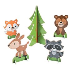 four paper cutouts of animals and trees with one bear, the other raccoon