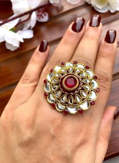 Shine like a glowing star in this exquisitely designed  ruby stone kundan ring. Pair it up with your silks and satins to add charm and charisma to your beautiful personality.   Ring is adjustable so can fit any size comfortably Item is ready to be shipped from New Delhi, India Kundan Ring, Glowing Star, Beautiful Personality, Ring Indian, Ruby Stone, Delhi India, Engagement Anniversary, Bridal Ring, Indian Jewellery