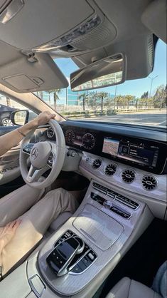 the interior of a mercedes s - class car with its dashboard and dash lights on