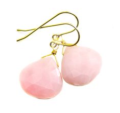 Soft Pink Peruvian Opal earrings. Large faceted heart cut. High quality french earwires - either 14k solid gold or filled or sterling silver available - you choose. Gemstone size is 16mm, 15 carats. Naturally lightweight stones. The mannequin shows the relative size and how they will hang. Pink Opal is naturally very lightweight to wear. Earrings hang 1.4 inches. Please check out my store for more gemstone earrings, bracelets and necklaces. Pink Opal Earrings, Peruvian Opal, Baroque Pearl Earrings, Opal Earrings, Large Earrings, Pink Opal, Fine Jewellery Earrings, Round Earrings, Natural Pearls